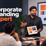 Corporate branding expert in Chennai reviewing a brand identity system with a business leadership team